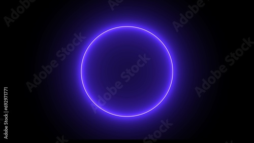 Blue color neon glowing circle and black background.