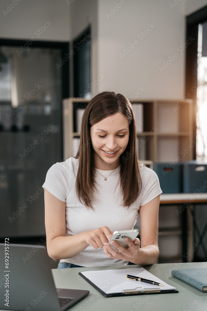 Women are sitting searching on laptop for information. Women are sitting searching on laptop for information.
