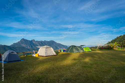 Beautiful landscape of Doi Luang Chiang Dao Mountain Peak from the viewpoint of the National Park with tourists camping tent in the morning at Chiang Dao District  Chiang Mai  Thailand.