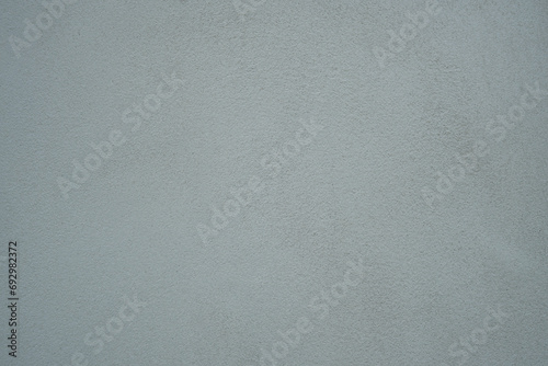 Gray cement wall texture, concrete wall close-up (spot focus)
