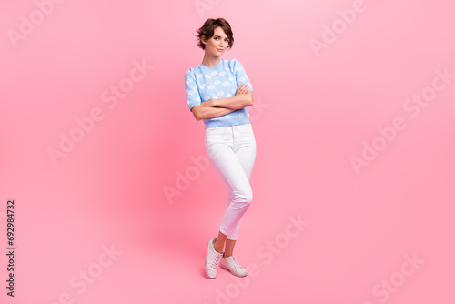 Full size photo of lovely positive successful girl crossed arms posing isolated on pink color background