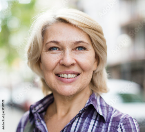 Portrait of elderly blonde woman
