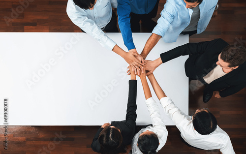 Cuadro en lienzo Panorama banner top view group of diverse office worker join hand over meeting table