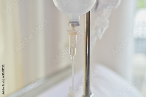 hospital equipment background image. A saline bag hung in the ward room. photo