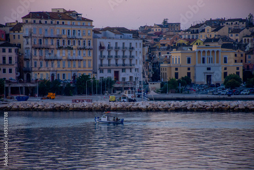 Cozy, colorful houses on Corfu Island, an excellent holiday destination on beautiful island, Ionian sea in Greece photo