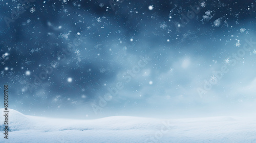 Beautiful wide background image of light snowfall falling over of snowdrifts, snowy weather