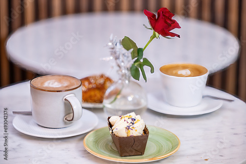 Photography Stockholm, Sweden A cozy cafe table with a Swedish fika or coffee and cake