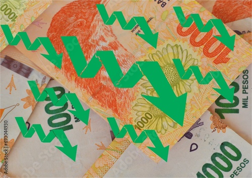 background of Argentine peso bills with downward arrows showing the devaluation of the Argentine currency