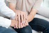  hold hand support each while discussing family issues. doctor encourages and empathy woman suffers depression. psychological, save divorce, Hand in hand together, trust, care