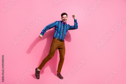 Full body length photo of funky guy dancing gentleman at retro discotheque with nostalgia atmosphere isolated on pink color background