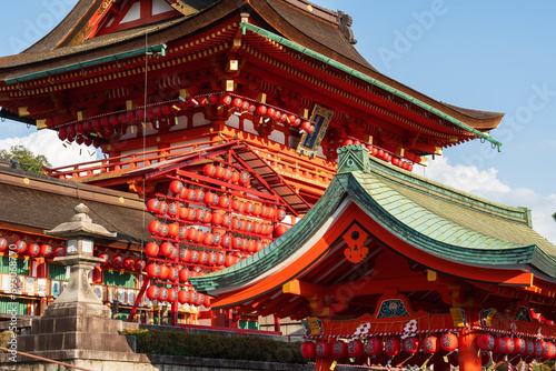 Kyoto, Japan - July 23 2023 : Tower Gate of Fushimi Inari Shrine ( Fushimi Inari Taisha ) decorated with lanterns during the Motomiya Festival or Motomiyasai Festival. photo