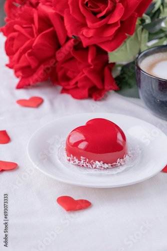 heart shaped glazed valentine cake in bed