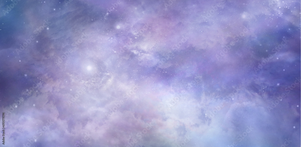 Beautiful heavenly celestial cloudscape background banner - heavenly  concept blue pink purple lilac ethereal deep space sky depicting the heavens above and a nebula ideal for spiritual theme

