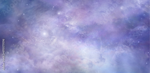 Beautiful heavenly celestial cloudscape background banner - heavenly  concept blue pink purple lilac ethereal deep space sky depicting the heavens above and a nebula ideal for spiritual theme
