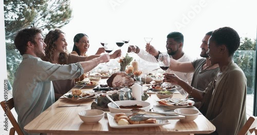 Friends, red wine and toast for holiday celebration, Christmas lunch and success at dining room table. Happy people with alcohol, glasses and cheers for reunion or thanksgiving party and food at home