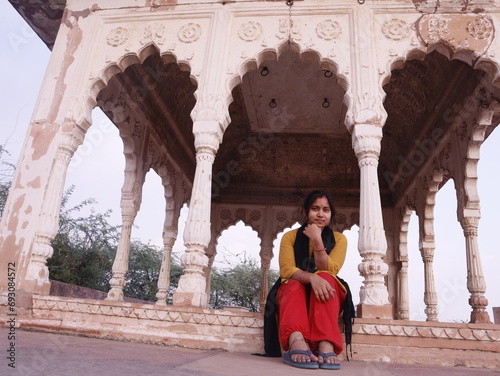 Girl traveling in jawahar Burj in lohagarh fort of bharatpur rajasthan a tourist places of India selective focus  photo