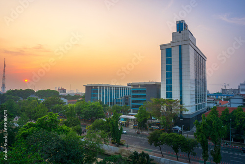 Indonesian morning view in the city of Jakarta during a beautiful morning with sunrise and tall buildings