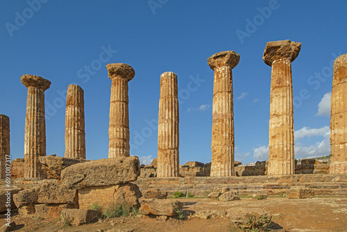 Famous eight columns of the Temple of Heracles or Hercules, known as Tempio di Eracle in Italian. Valley of the Temples, Agrigento, Sicily, Italy. photo