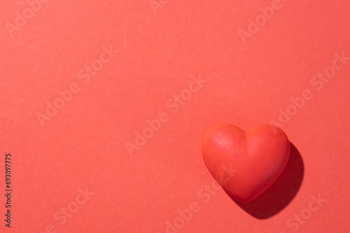 Valentines day. Red heart with copy space isolated on red