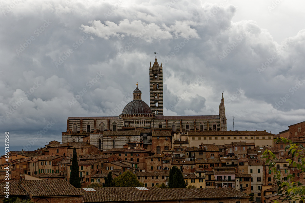 Siena. Old Medieval city in Tuscany in Italy Europe. Art and culture. Tourists from all over the world for Piazza del Campo Palio Duomo Tower del Mangia and the oldest bank banco dei Paschi 
