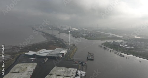 Aerial drone view on the entrance of the Delfzijl seaport near Groningen, The Netherlands. photo
