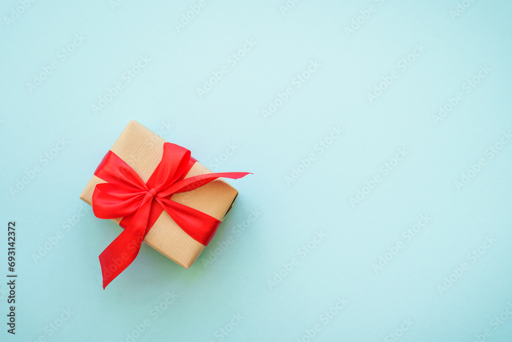 Christmas background. Christmas present boxes and holiday decorations at blue. Flat lay image with copy space. Christmas background. Christmas present boxes and holiday decorations at blue. Flat lay image with copy space.