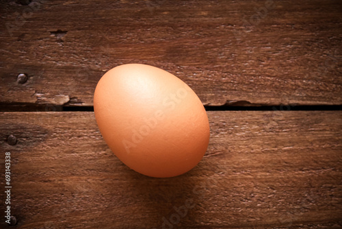 Egg on a rustic wooden board