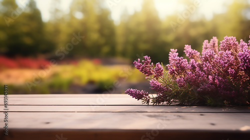 Empty old wooden table with defocused forest full of heather flowers background, Template, Mock up