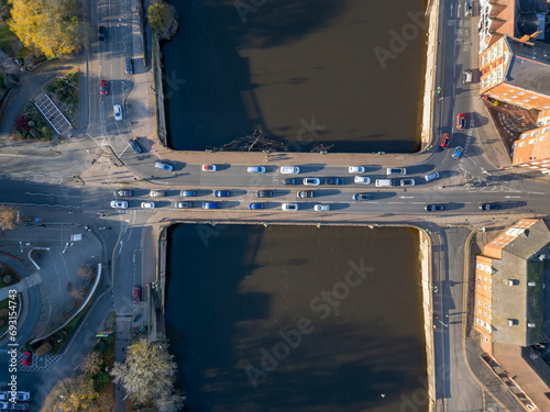 Looking straight down at traffic crossing the Worcester Bridge in Worcestershire, UK photo