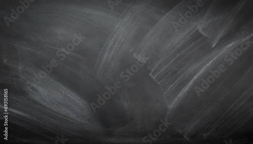 abstract texture of chalk rubbed out on blackboard or chalkboard background school education dark wall backdrop or learning concept
