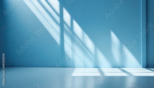 minimal abstract light blue background for product presentation shadow and light from windows on wall