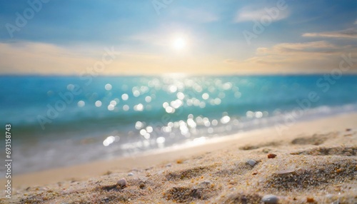 seascape abstract beach background blur bokeh light of calm sea and sky focus on sand foreground