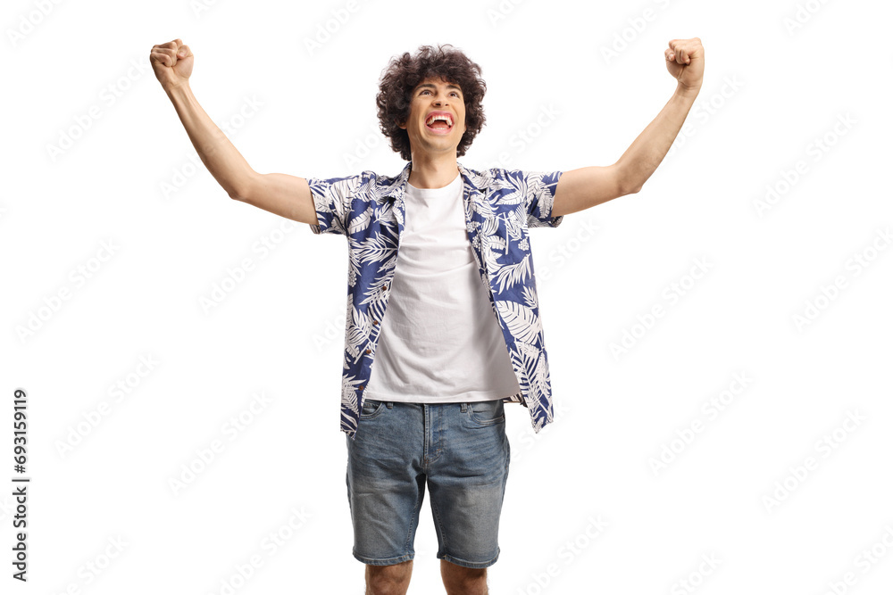 Overjoyed young man gesturing happiness with arms up Overjoyed young man gesturing happiness with arms up