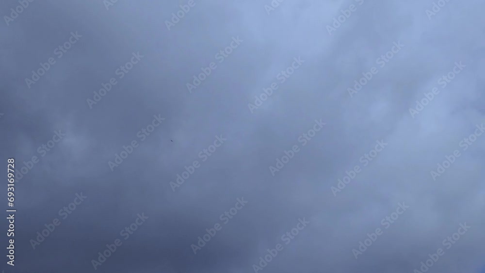 Time lapse of white running clouds on a blue sky. Stock full HD video with beautiful skies.