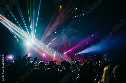 Crowd Enjoying Light Show at Music Concert © Victoria