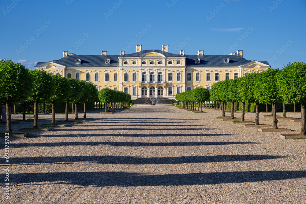 View of Latvian tourist landmark attraction -  Rundale palace and beautiful park in the summer, Pilsrundale, Latvia.