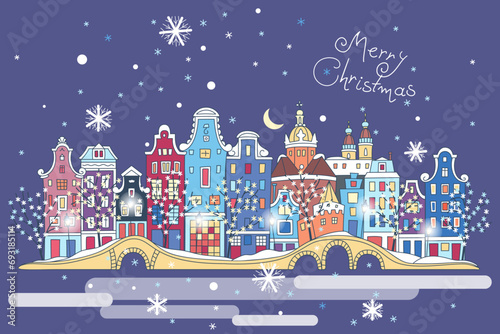 Christmas night city with traditional european houses and Christmas lights