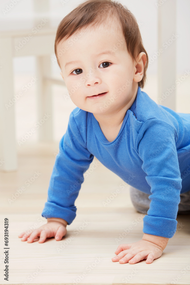 Playful, crawling and portrait of baby on floor for child development, learning and youth. Young, curious and adorable with infant kid on ground of family home for growth, progress and milestone Playful, crawling and portrait of baby on floor for child development, learning and youth. Young, curious and adorable with infant kid on ground of family home for growth, progress and milestone