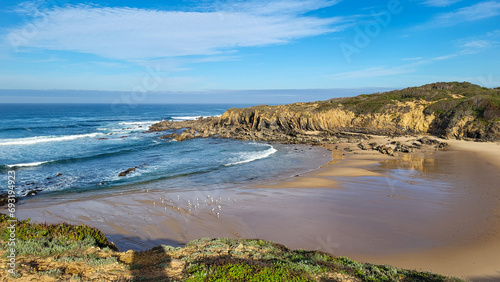 Almograve Beach, Alentejo, Portugal, Vicentine Coast Natural Park Portugal, Hiking Rota Vicentina the Fisherman's Trail Along the Alentejo Coastline to Wild and Rugged Beaches Narrow Cliff Side Paths. photo