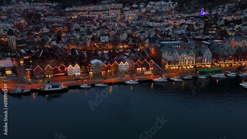 Aerial view of the historic Bryggen district in Bergen, Norway, during winter dusk time photo