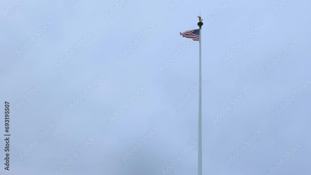 The American flag flying in the United States of America shows independence. National patriotism The American flag flying in the United States of America shows independence. National patriotism