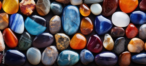 many colorful stones are arranged close together