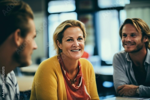 Classroom Connection: Smiling Teachers Engaged in Positive Discussion