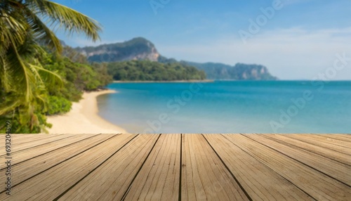 wood floor deck on blur beach background can be used for display or montage your products high quality photo © Kelsey
