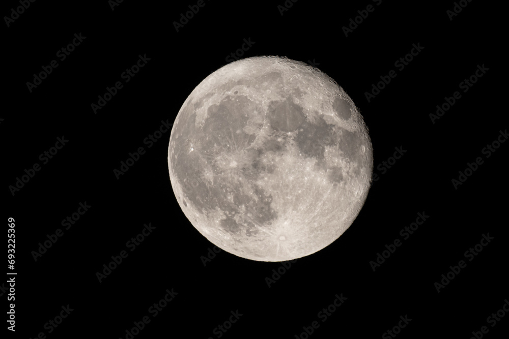 Full moon photographed with a telescope and reflex camera where the craters on the lunar surface can be seen. The seventh continent will be the destination for space travel and future moon landings Full moon photographed with a telescope and reflex camera where the craters on the lunar surface can be seen. The seventh continent will be the destination for space travel and future moon landings