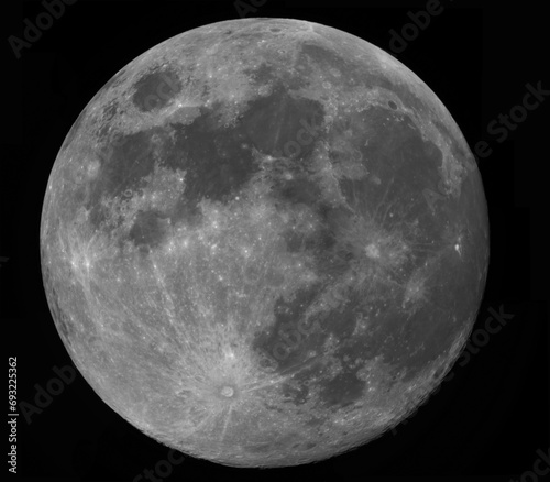 Photograph of the full moon, taken with a camera on a day of a large full moon. Craters, relief and characteristic areas of the moon