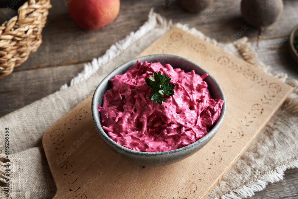 A bowl of beetroot salad with sour cream A bowl of beetroot salad with sour cream