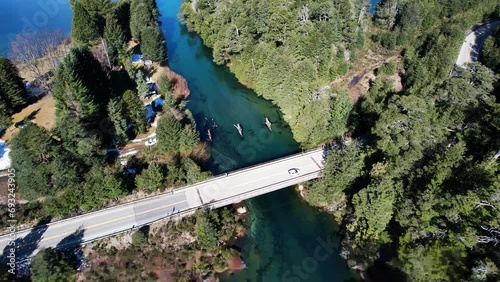 Vehicle driving on bridge beautiful remote landscape of Argentina, aerial view photo