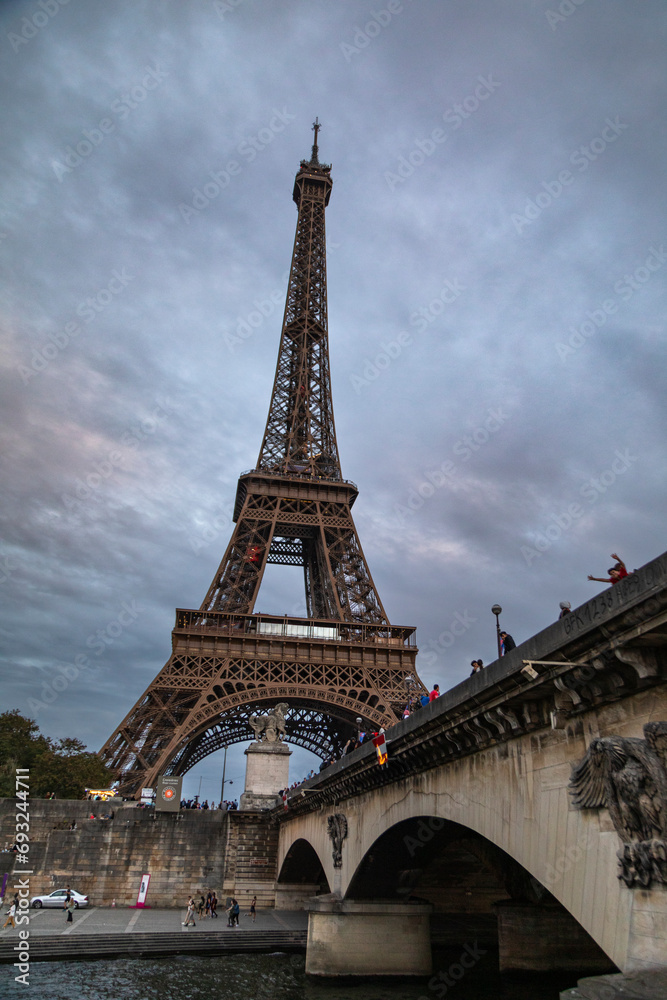 Eiffel Tower with a cloudy sky at dusk, Paris, France
