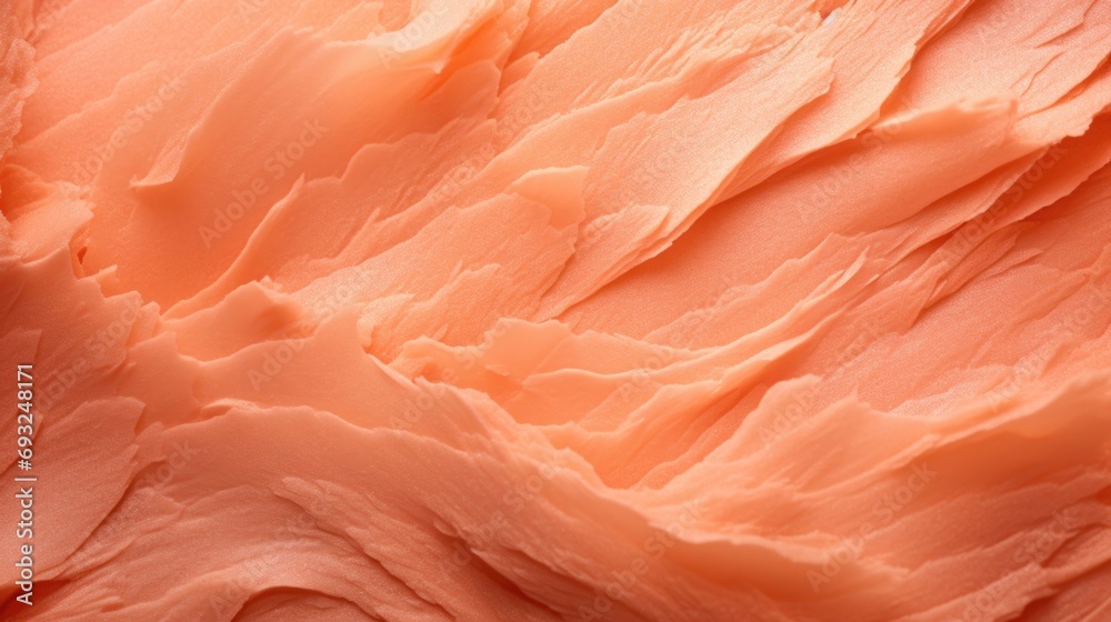 Closeup of a Peach Fuzz colored backdrop with a gradient of beautiful blush tones